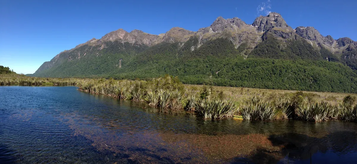 Mirror Lakes beside the Milford Road, a stop on the drive to a Milford Sound boat tour