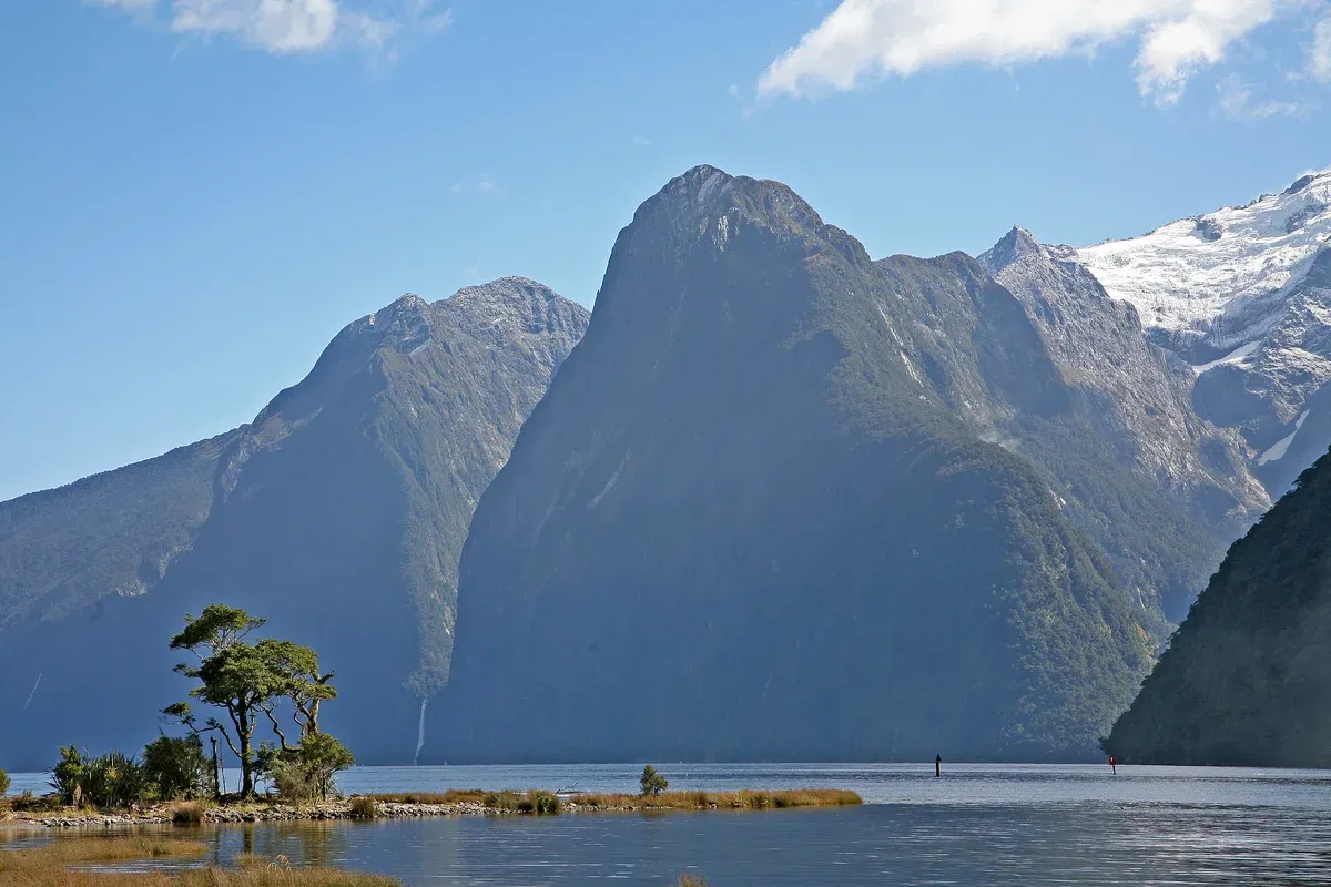 The Lion above the fiord with a glacier behind, seen on a Milford Sound boat tour